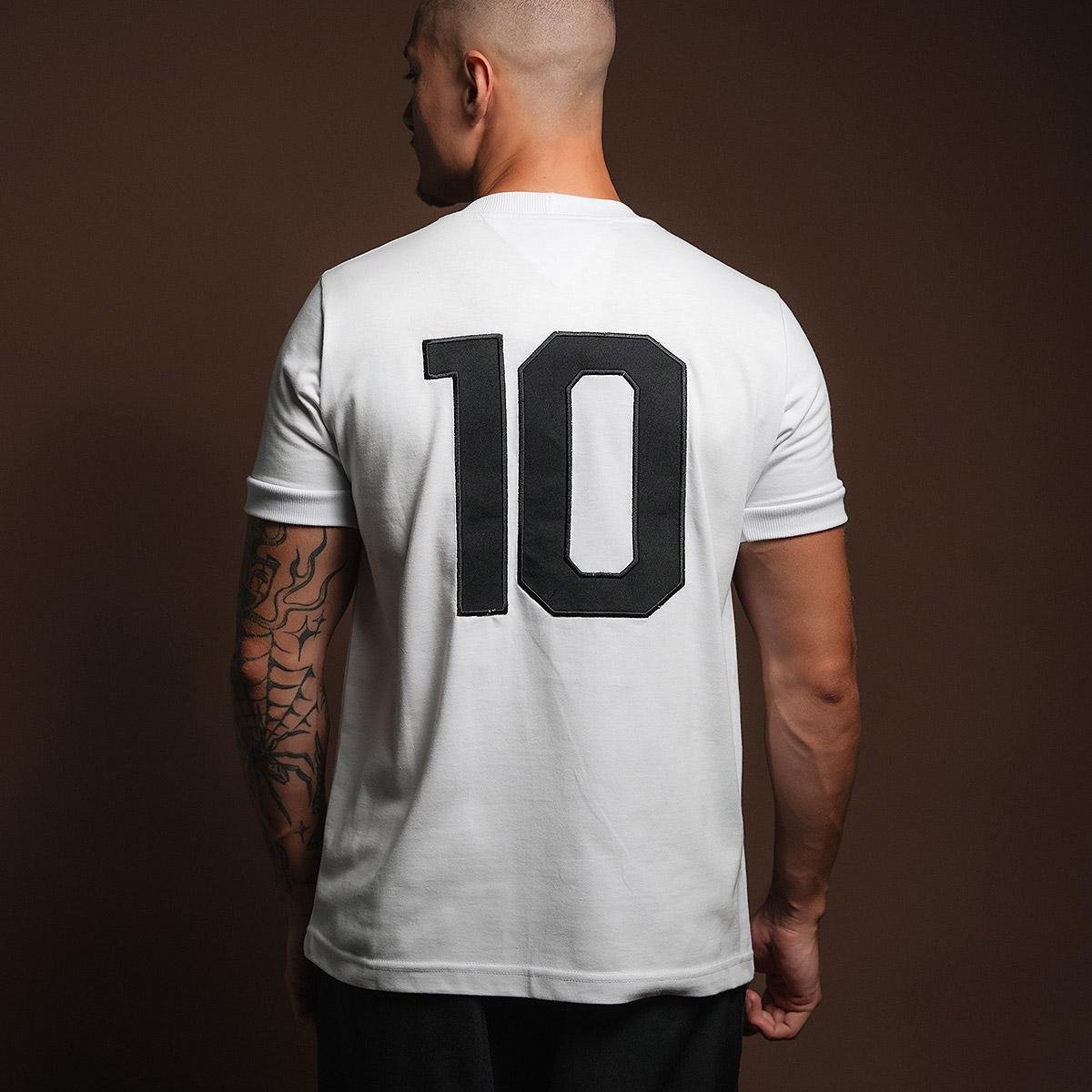 https://static.santosstore.com.br/produtos/camisa-santos-retro-1969-milesimo-gol-pele-masculina/14/AJM-0314-014/AJM-0314-014_zoom2.jpg